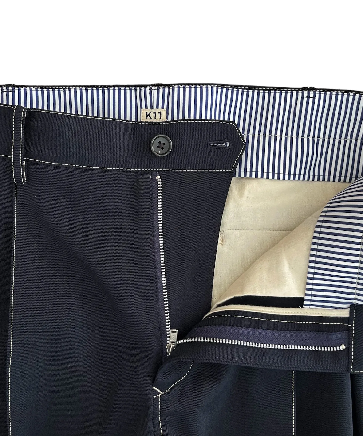 Pleat-detail pants "NAVY"